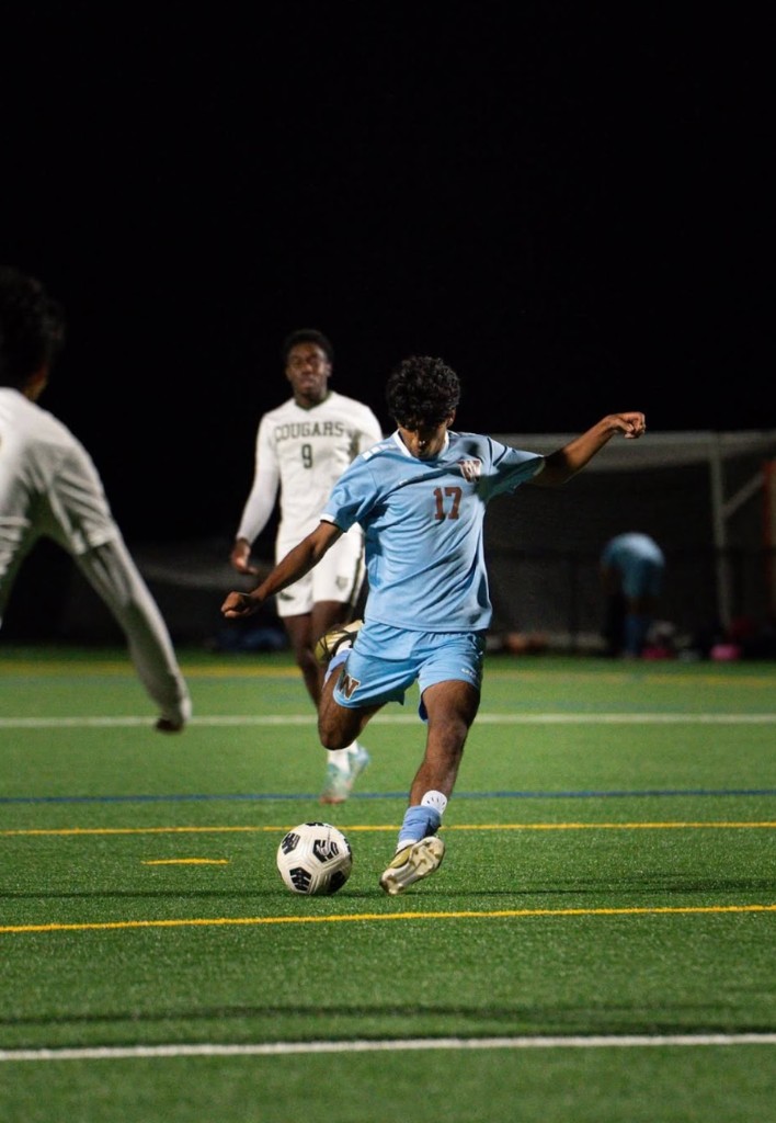 Sohom Vir playing soccer at night